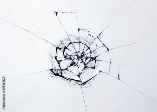 Broken glass protective glass against impact. Cracks and lines isolated on white background. Cracked tempered, laminated and heat-strengthened glass to protect your phone screen.