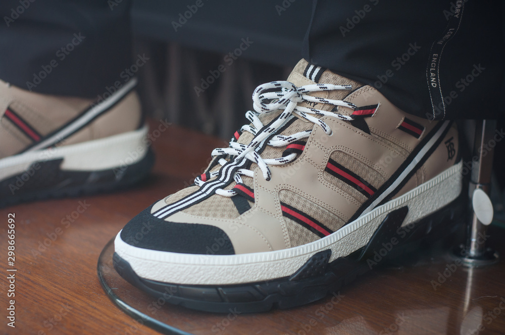 Mulhouse - France - 27 October 2019 - Closeup of Burberry sport shoes on  mannequin in luxury fashion sote showroom Stock Photo | Adobe Stock