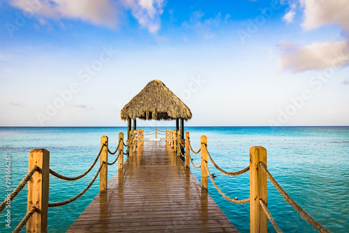 hot tropical day the Caribbean sea pier with pergola