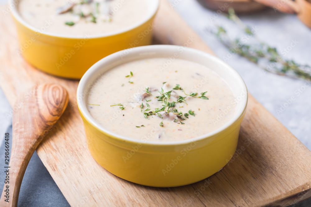 A bowl of delicious homemade cream of mushroom soup. A bowl of delicious homemade cream of mushroom soup.