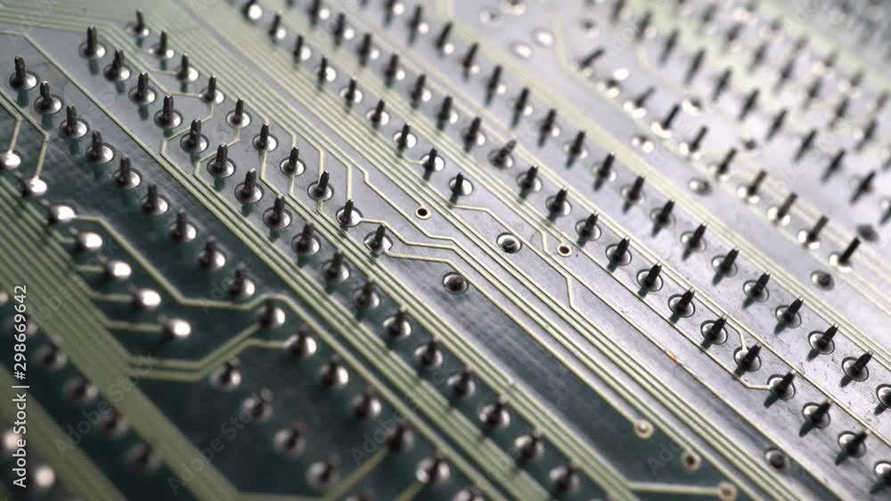Circuit board. Printed circuit board surface, extreme close up. Electronic technology background. Dolly shot, sliding camera move and selective focus 4k footage. Circuit board. Printed circuit board surface, extreme close up. Electronic technology background. Dolly shot, sliding camera move and selective focus 4k footage.