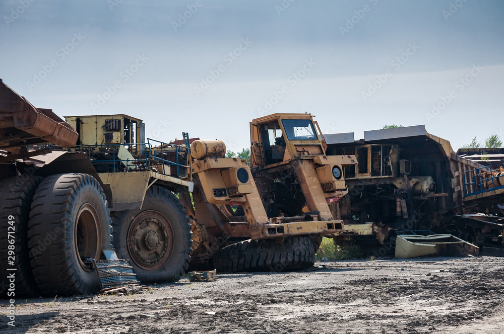 remains of old quarry trucks and machinery on junk yard remains of old quarry trucks and machinery on junk yard