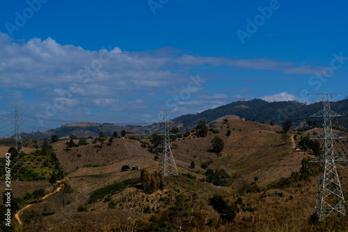 Bald Mountain And high-voltage electricity poles Concept of environmental destruction