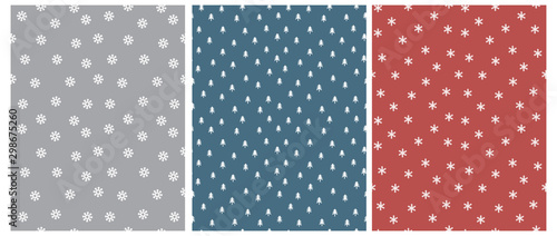 Cute Scandinavian Style Winter Vector Pattern with White Trees and Snowflakes Isolated on a Gray, Blue and Pale Red Background. Simple Winter Forest Vector Print and Snowy Sky Design.