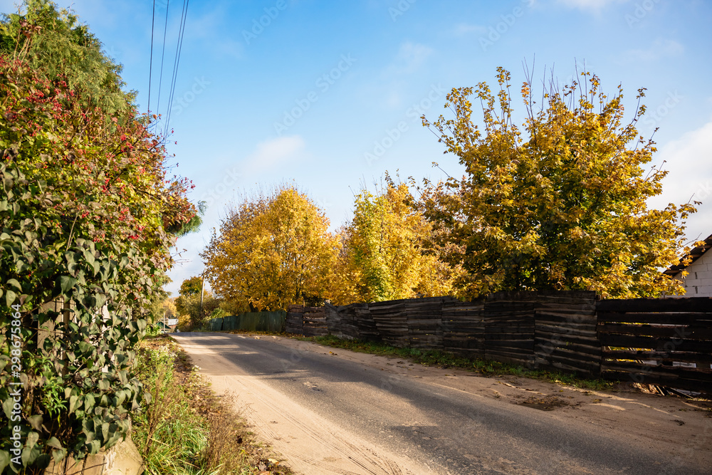 Fototapeta premium Rural landscape with empty countryside dirt road
