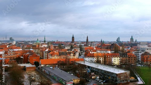 Wallpaper Mural Hanover, Germany. Aerial view of Hanover, Germany skyline during a cloudy day. Clouds over historical landmarks in the city Torontodigital.ca
