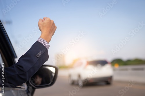 Bilde på lerret image of businessman in a celebrating success with a fist pump while driving in