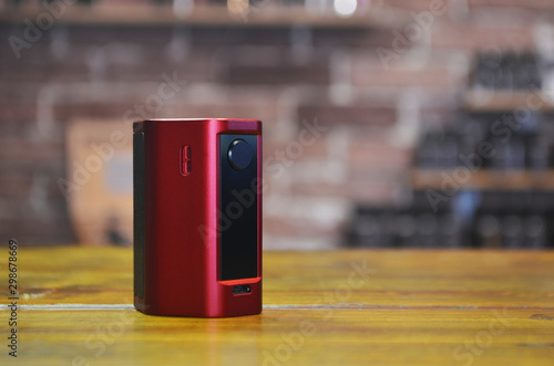 Wallpaper Mural Electronic cigarette on a background of vape shop. E-cigarette for vaping. Torontodigital.ca