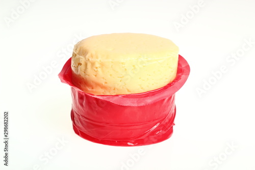 Cheese in red plastic package