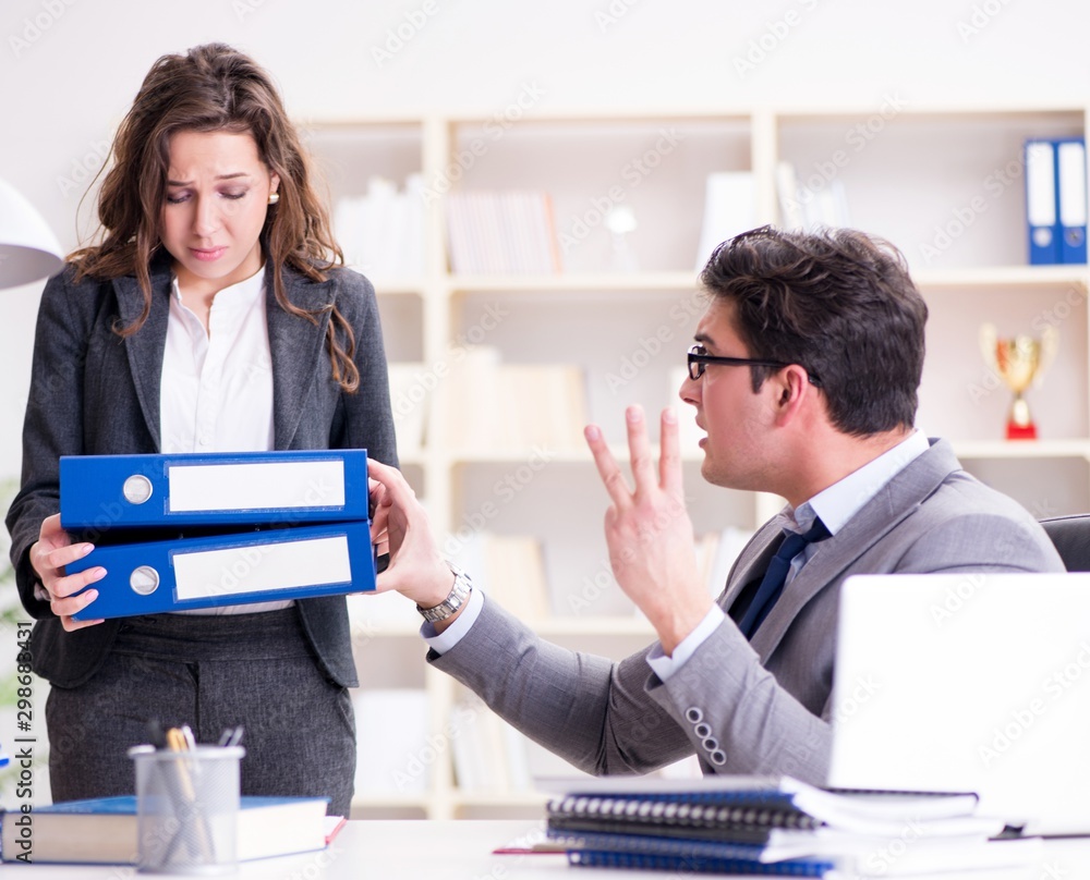 The angry boss unhappy with female employee performance The angry boss unhappy with female employee performance