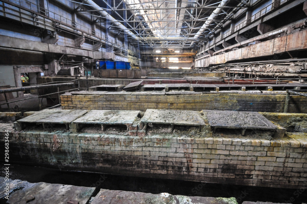 Fototapeta premium Baths and cans of chemically active liquid in hazardous industries