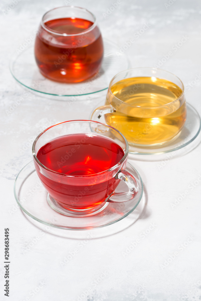 assortment of tea in glass cups, vertical top view assortment of tea in glass cups, vertical top view