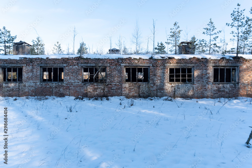 The room with windows. Lots of windows in the building.