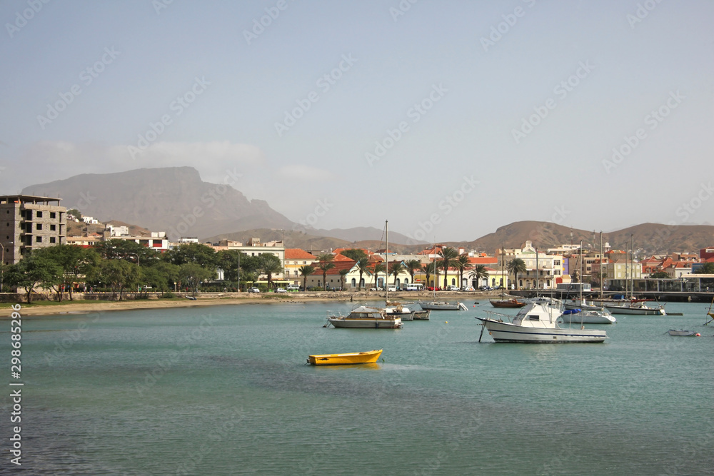 Obraz premium Harbor with fishing boats & the water front of Mindelo on Sao Vicente Island, Cape Verde Islands.