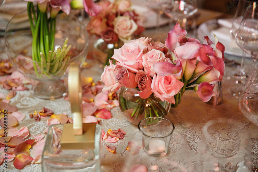 catering at a top event, glasses and flowers on the table, preparation for a significant event, beautiful dishes and glasses on the table, New Year's holiday table catering at a top event, glasses and flowers on the table, preparation for a significant event, beautiful dishes and glasses on the table, New Year's holiday table