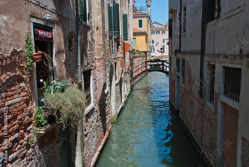 Venice, Italy. View of ancient buildings and narrow canal in San Polo, district in Venice