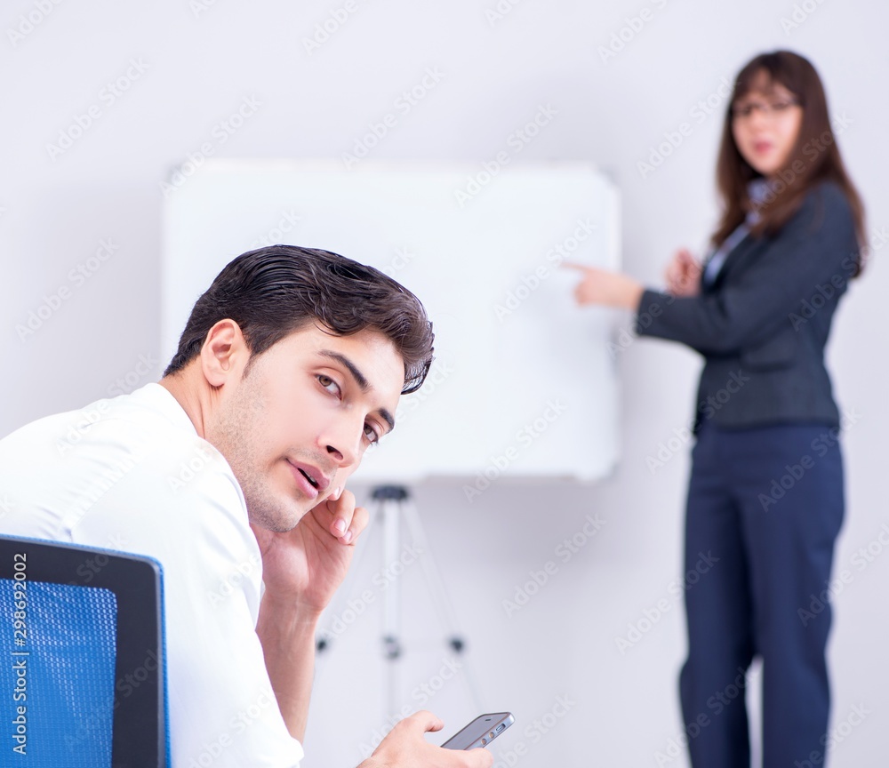 Business presentation in the office with man and woman Business presentation in the office with man and woman