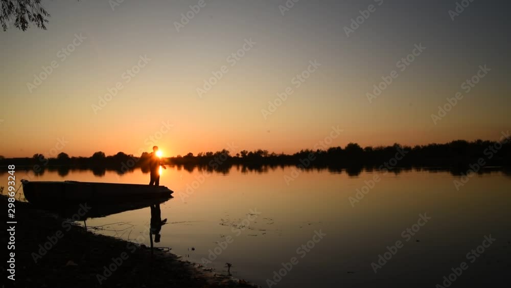 Silhouette of man enjoying fishing with beautiful sunset. Silhouette of man enjoying fishing with beautiful sunset.