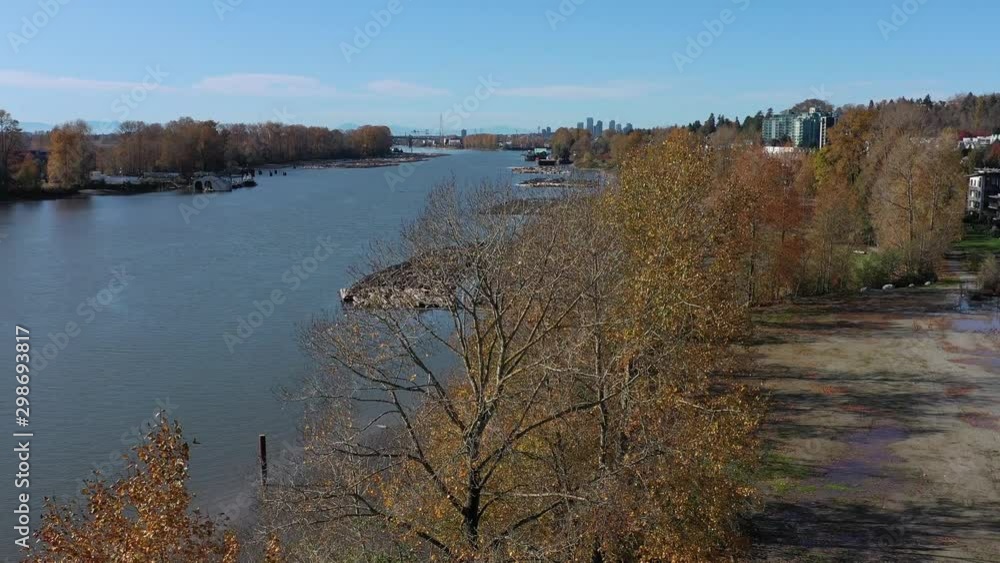 Log Boom Tug at River in Vancouver, Canada. Drone flying. Aerial 4k view. Log Boom Tug at River in Vancouver, Canada. Drone flying. Aerial 4k view.