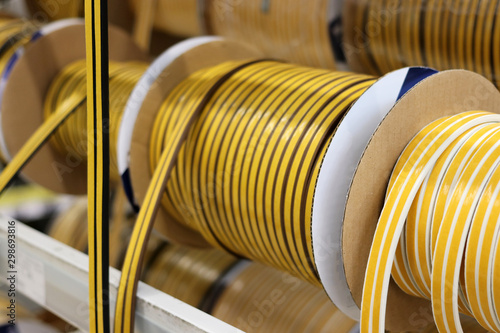 Rolls with insulation tape on the counter of a hardware store.