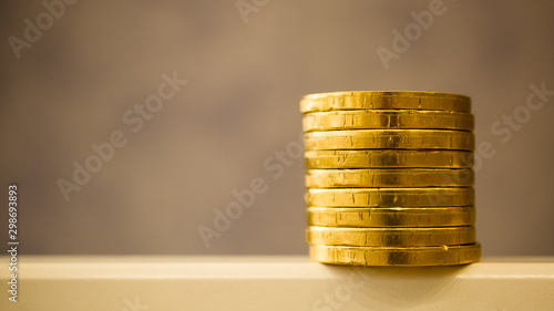 fake money - chocolate in the form of coins covered with Golden foil   photo