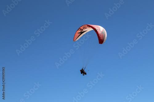 Paragliding in the mountains. The coast of the Mediterranean Sea. Kemer, Turkey.