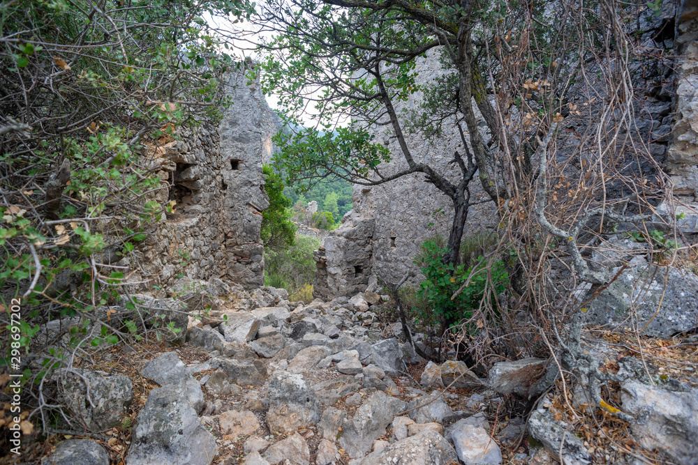 Acropolis Hill Castle. Olympos antique city ruins. Kemer, Antalya, Turkey. Acropolis Hill Castle. Olympos antique city ruins. Kemer, Antalya, Turkey.