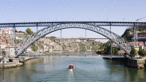 flying with drone in Porto above Dom Luis Bridge over the Douro river in Porto