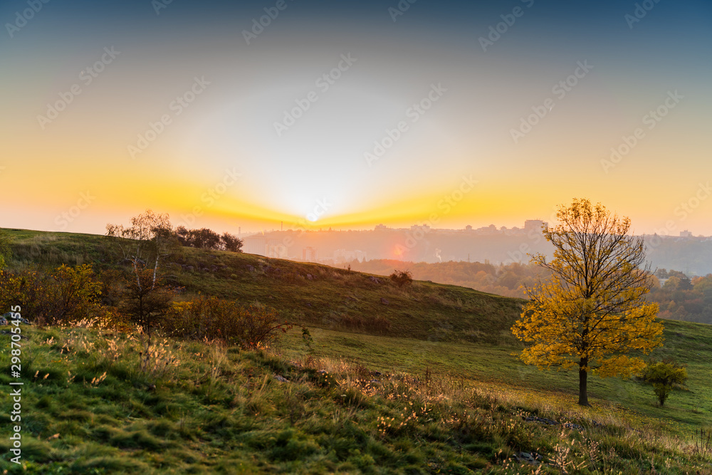 Obraz premium autumn landscape with mountains at sunrise