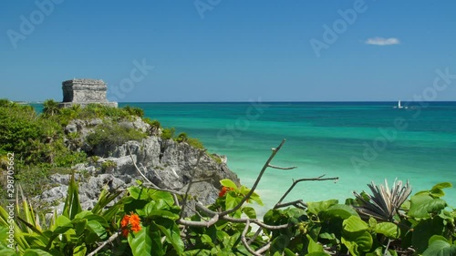 Maya ruins next to the turquoise caribbean sea, Tulum, Quintana Roo, Mexico. Slowmotion photo