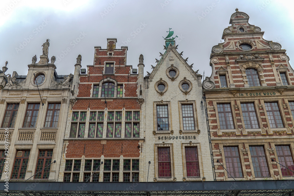 Architectural facade detail at old buildingas in Leuven, Belgium