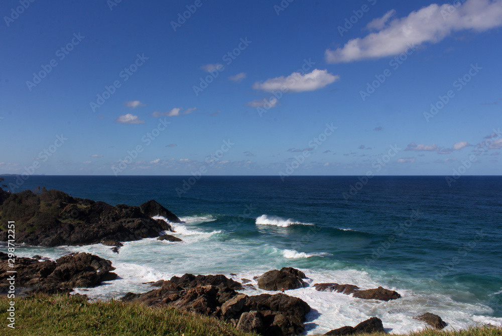 Pacific Ocean Meets Australian East Coast with Shades of Blue and Big Waves Hitting the Rocks
