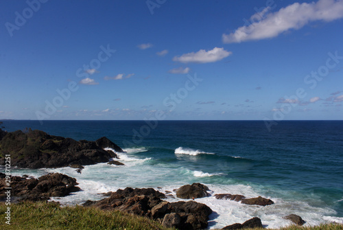 Pacific Ocean Meets Australian East Coast with Shades of Blue and Big Waves Hitting the Rocks © Arda