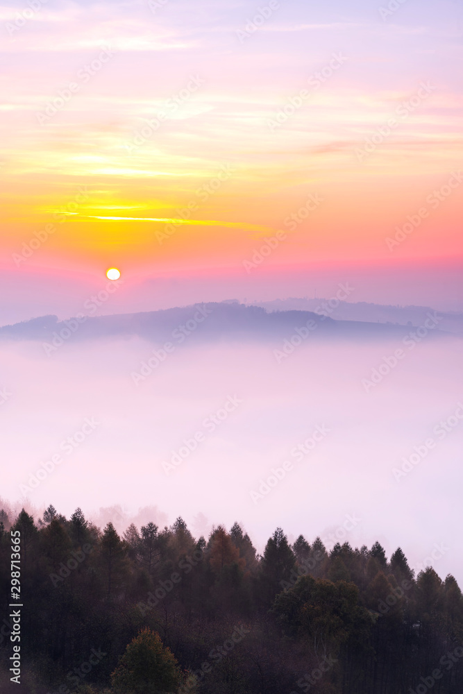 Sun over Clouds at Early Foggy Morning in Autumn Sun over Clouds at Early Foggy Morning in Autumn
