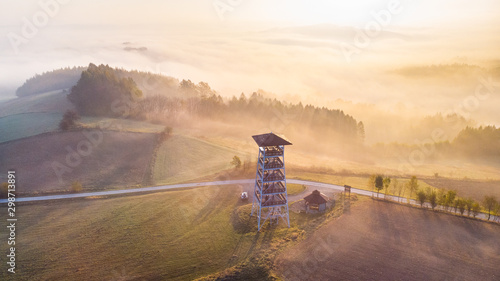 Look Out Tower in Brusnik,Ciezkowice. Polish Landscape at Foggy Sunrise photo