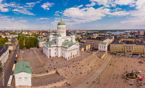 Helsinki Suurkirkko, Finland: beautiful top view from drone on historic city centre, Senate square and Evangelical Lutheran Church St. Nicholas (Cathedral Basilica). Sanny summer day.
