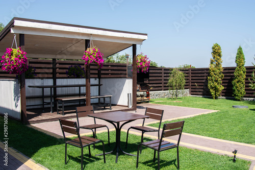 Garden Or Backyard Outdoor Pavilion With Wood Pergola, Bar Counter, Brick Oven, Fireplace And Barbecue For Cookout Food. Summer Party Place.