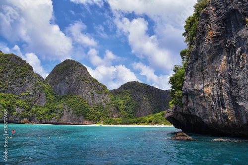 Island, Ocean views near Phuket Thailand with Blues, Turquoise and Greens oceans, mountains, boats, caves, trees resort island of phuket Thailand. Including Phi Phi, Ko Rang Yai, Ko Li Pe and other is