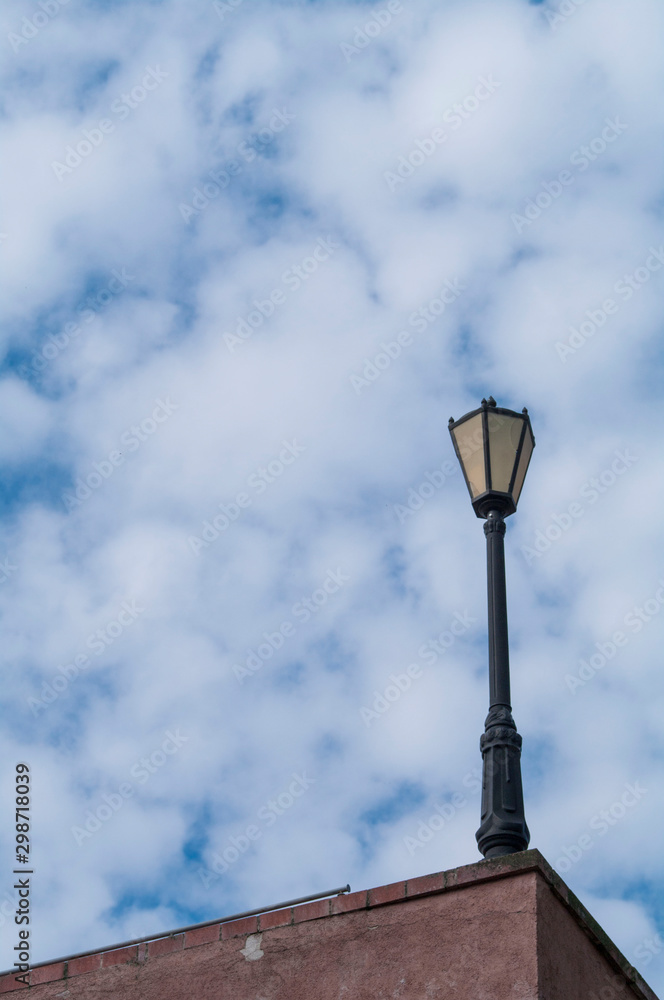 lantern against a cloudy sky