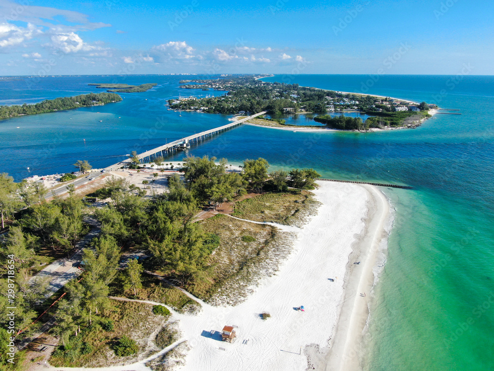 Fototapeta premium Aerial view of bridge between Anna Maria Island and Longboat key, barrier island on Florida Gulf Coast. Manatee County. USA