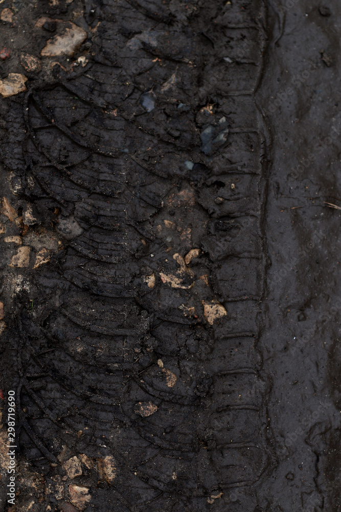 car wheel marks on muddy road car wheel marks on muddy road