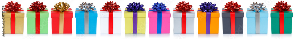 Group of christmas presents birthday gifts in a row isolated on white - obrazy, fototapety, plakaty 