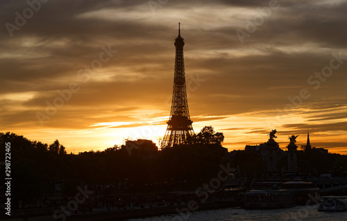 The Eiffel Tower at Sunset, Paris, France.It is the most popular travel place and global cultural icon of the France and the world. © kovalenkovpetr