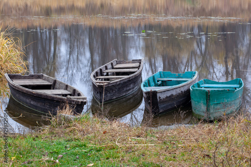 Wooden boats on the river in autumn
