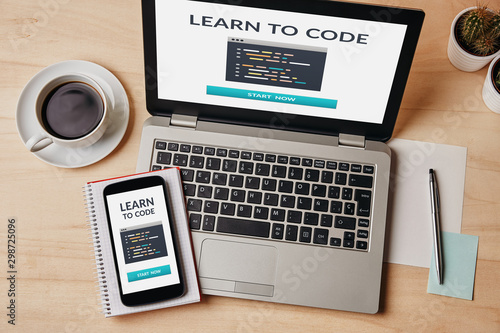 Learn to code concept on laptop and smartphone screen