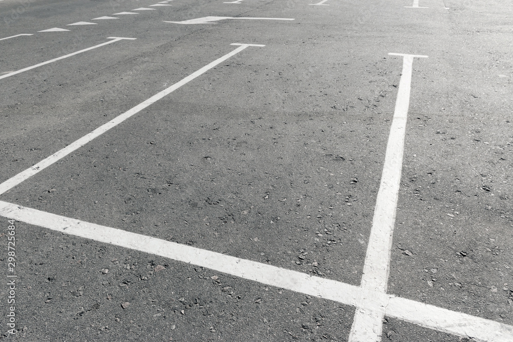 Fototapeta premium Road marking on asphalt with parking spots