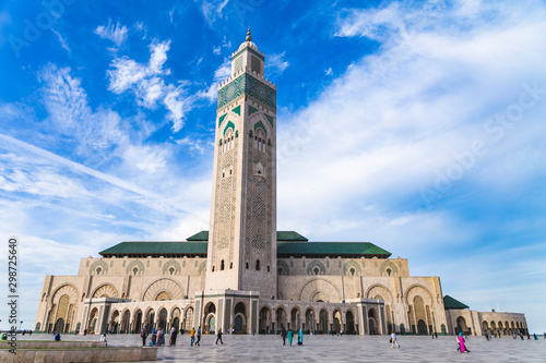 View of Hassan II mosque against blue sky - The Hassan II Mosque or Grande Mosquée Hassan II is a mosque in Casablanca, Morocco.