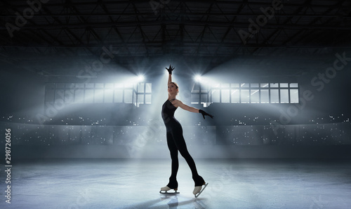 Figure skating girl in ice arena. © VIAR PRO studio