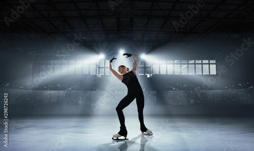 Figure skating girl in ice arena. © VIAR PRO studio