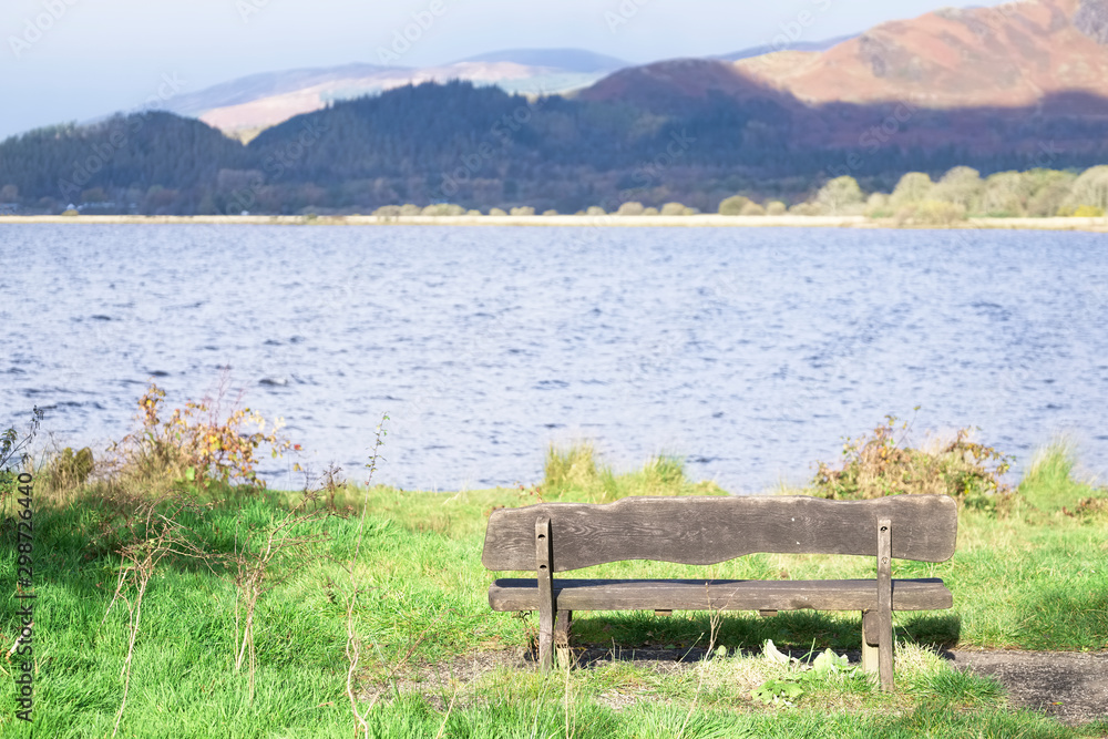 Empty lone bench at Endrick Net Bay viewpoint at Loch Lomond Empty lone bench at Endrick Net Bay viewpoint at Loch Lomond